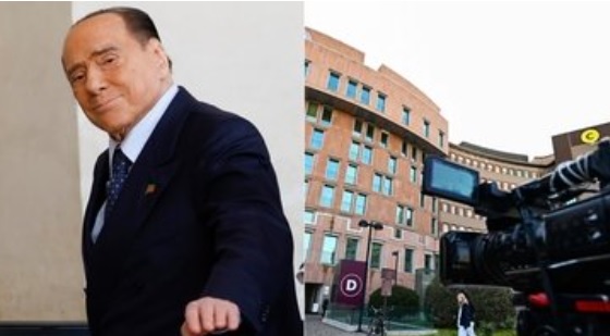 Milano – Sorpresa al San Raffaele: a trovare Berlusconi anche il sosia di John Travolta. Ma viene respinto all’ingresso