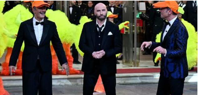Sanremo, a John Travolta 1 milione di euro per fare il “Ballo del qua qua”. E scoppia la polemica